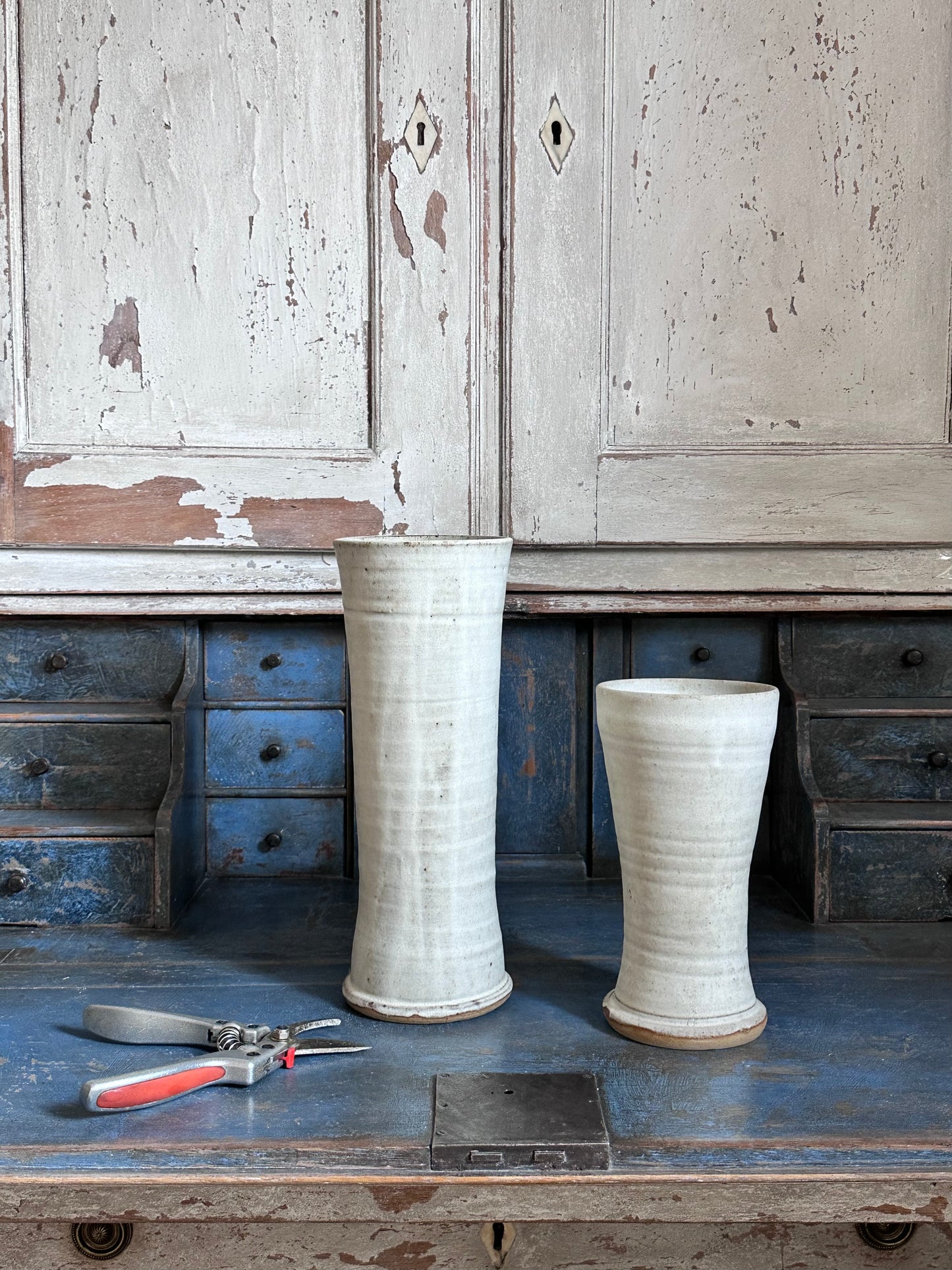 Hand thrown pottery vases in off-white glaze