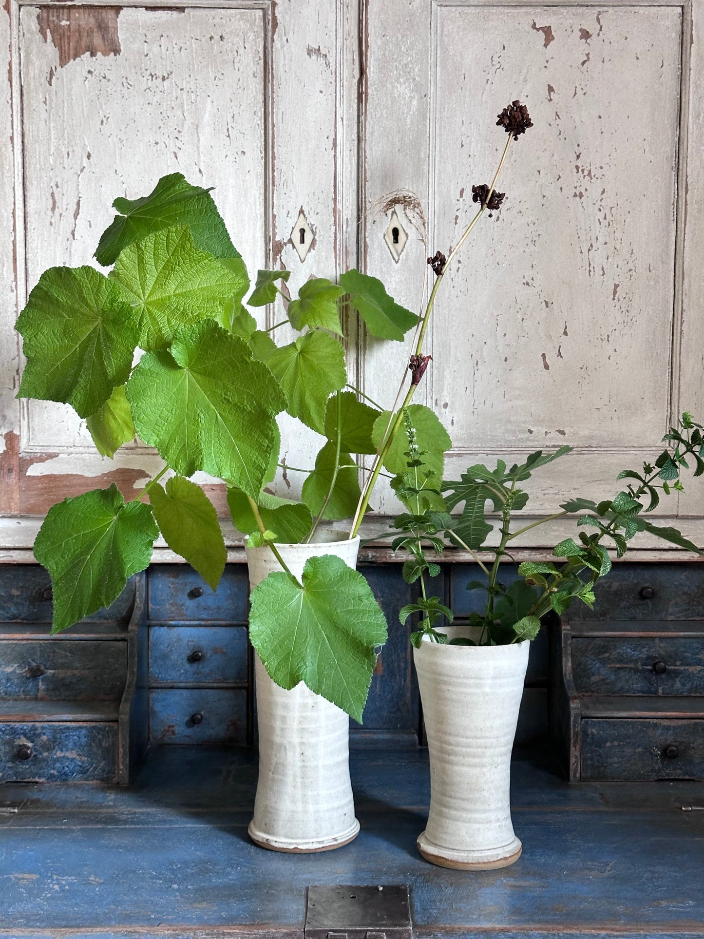 Hand thrown pottery vases in off-white glaze