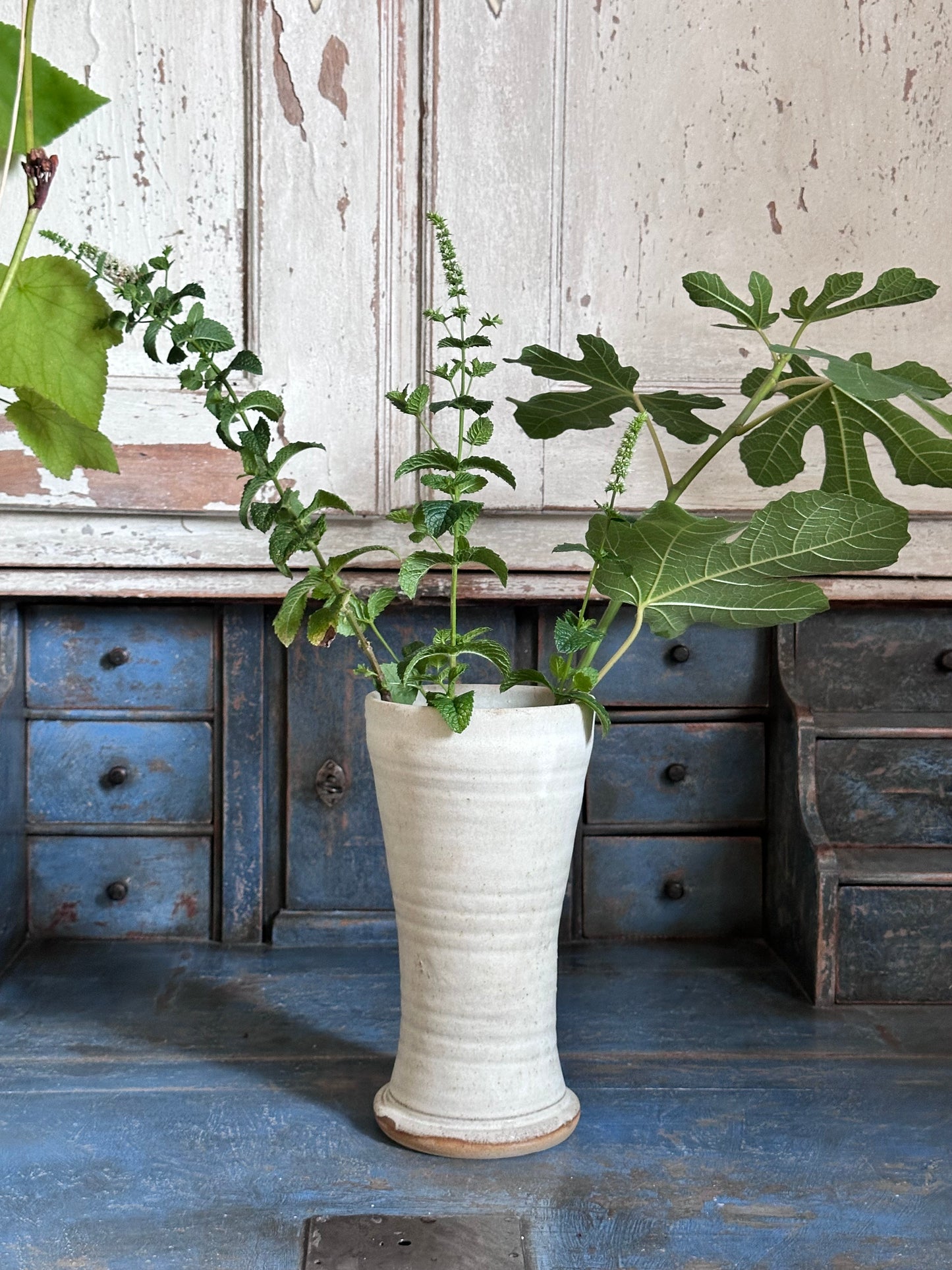 Hand thrown pottery vases in off-white glaze