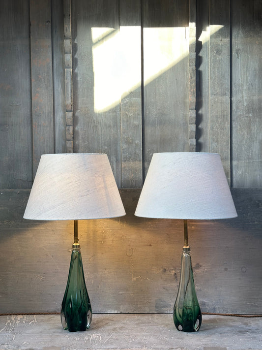 A pair of rare green glass table lamps, circa 1960