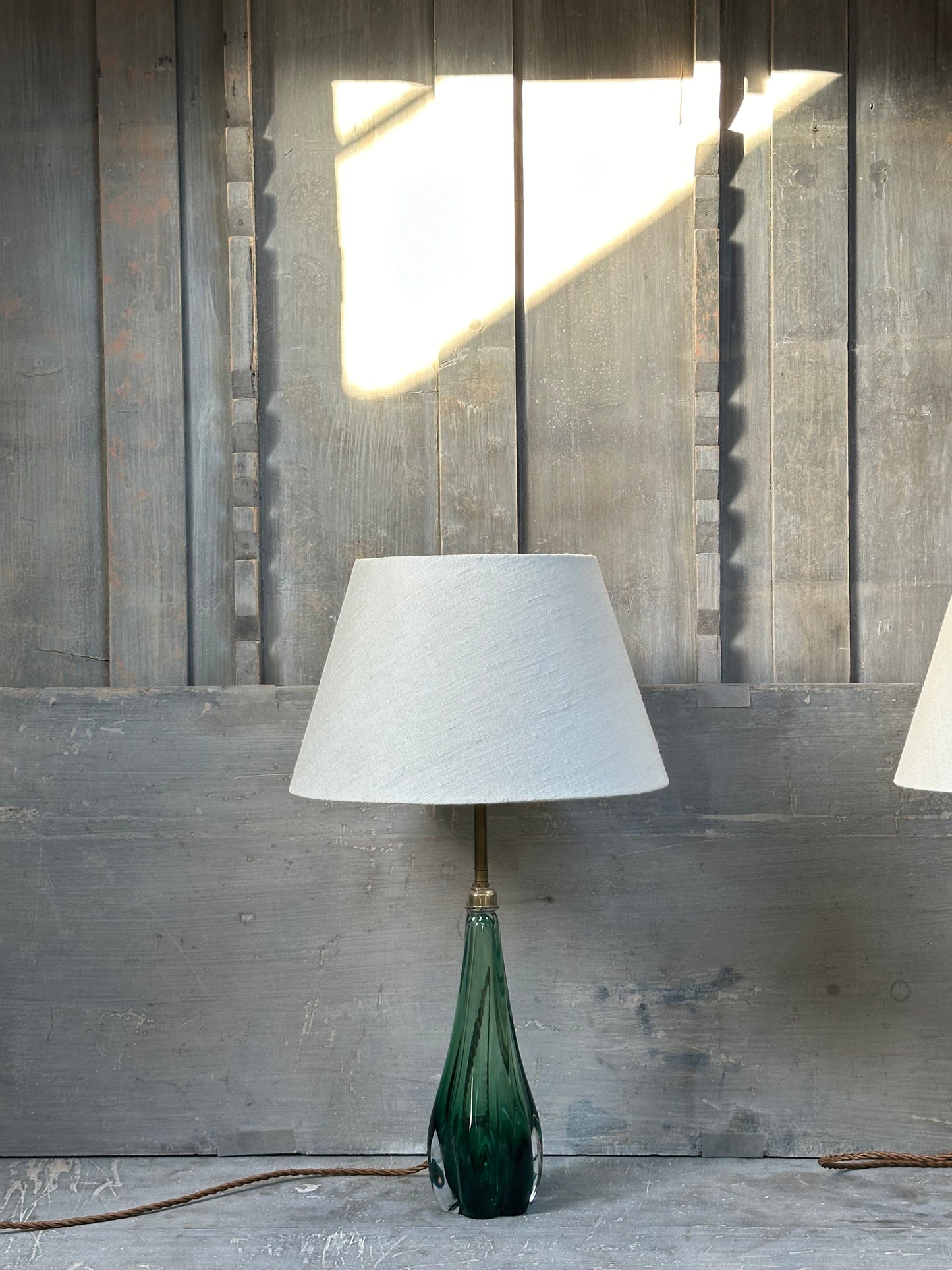 A pair of rare green glass table lamps, circa 1960