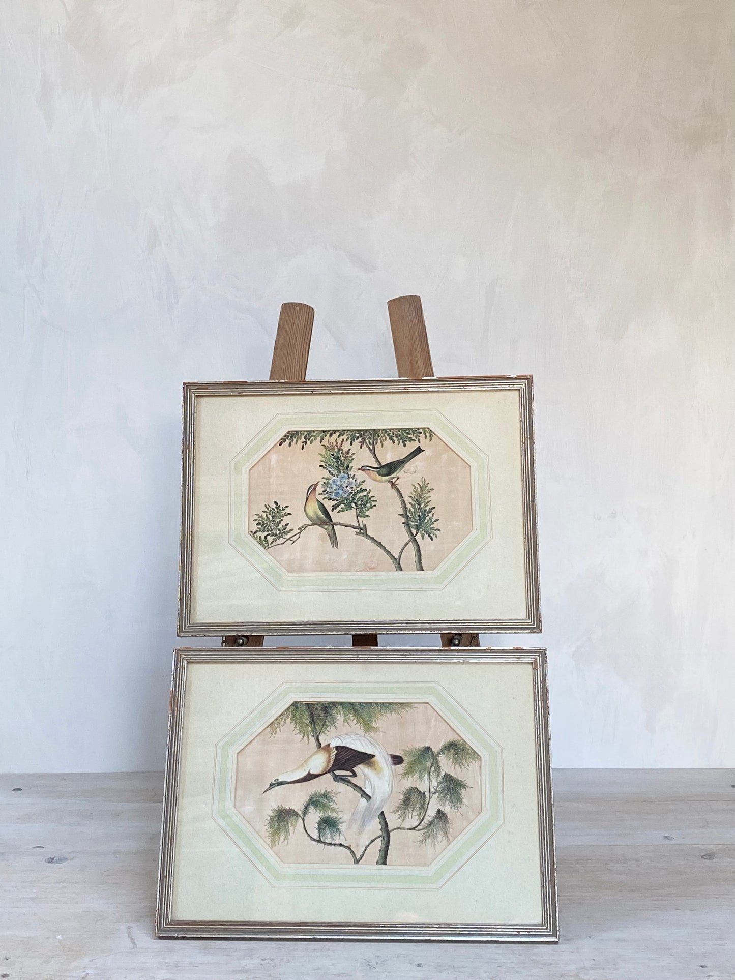 A pair of lovely Chinese silk hand painted water colours of birds in their original frames.