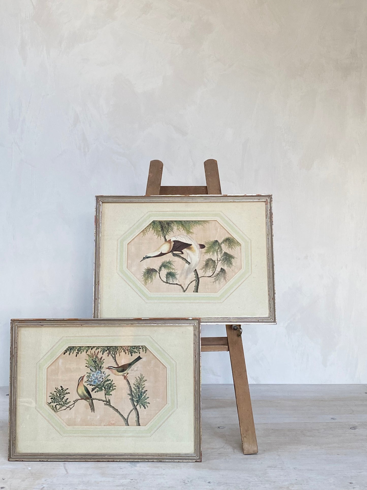 A pair of lovely Chinese silk hand painted water colours of birds in their original frames.
