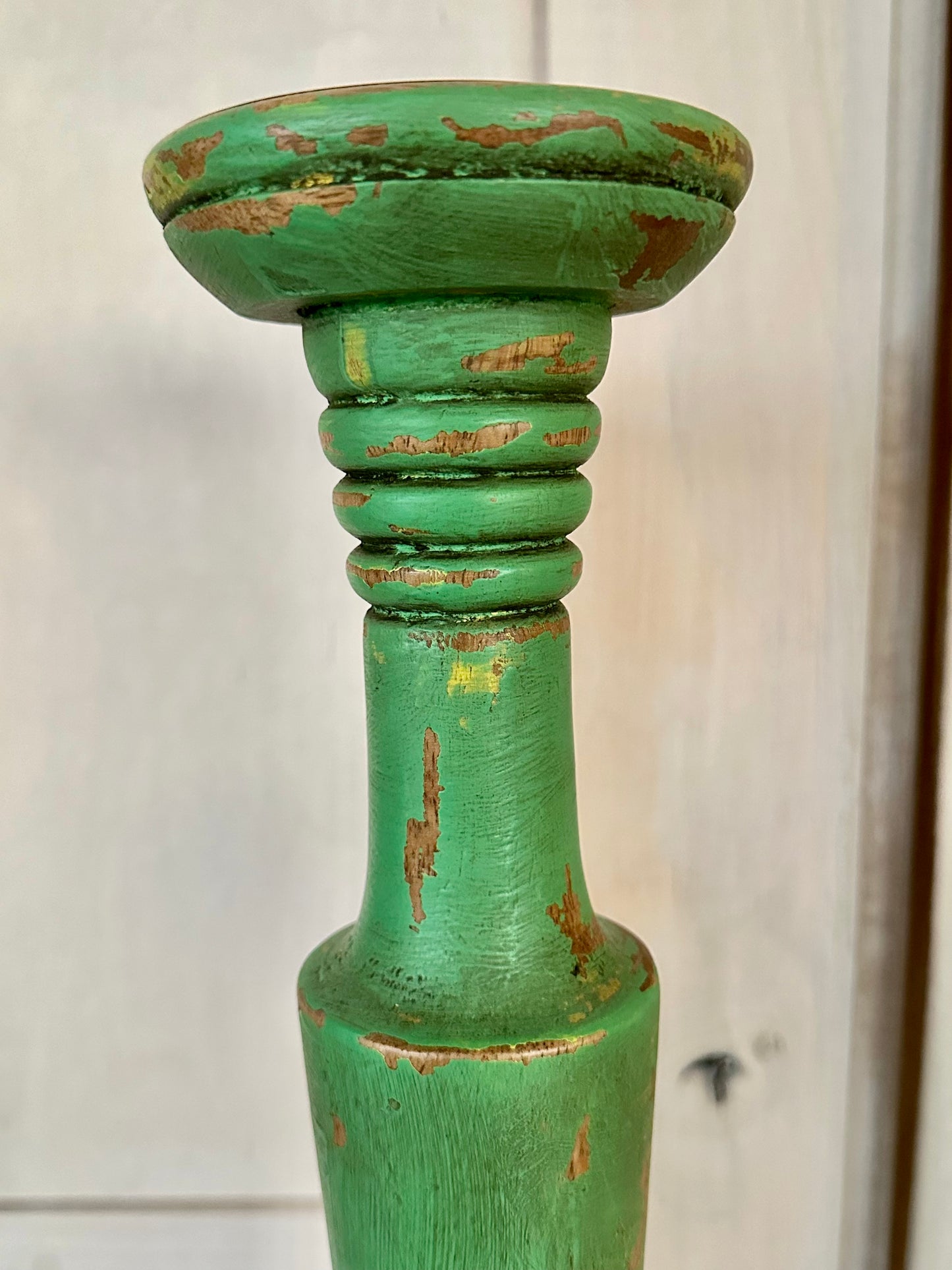 A pair of Indian candlesticks in a wonderful viridian green