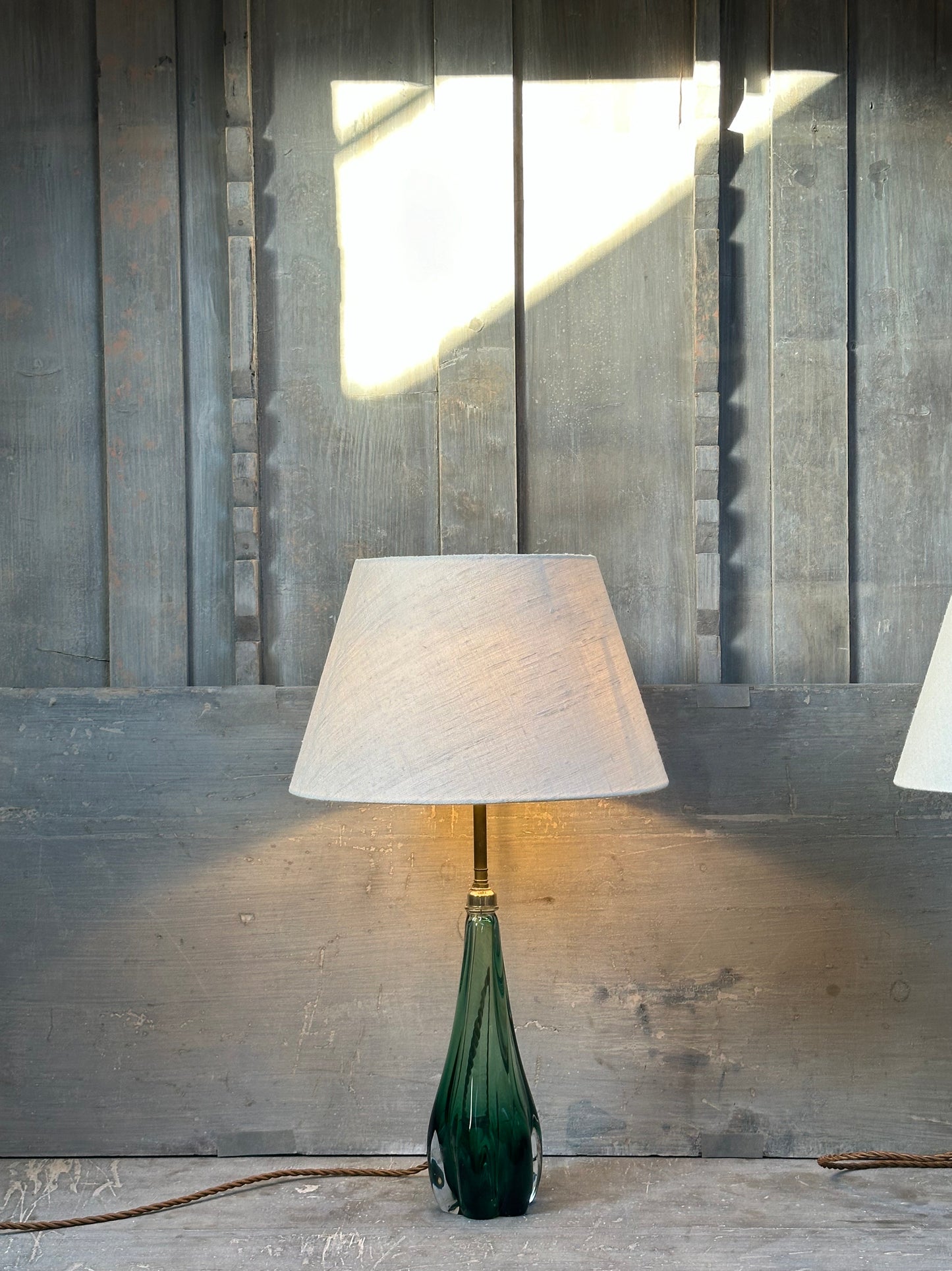 A pair of rare green glass table lamps, circa 1960