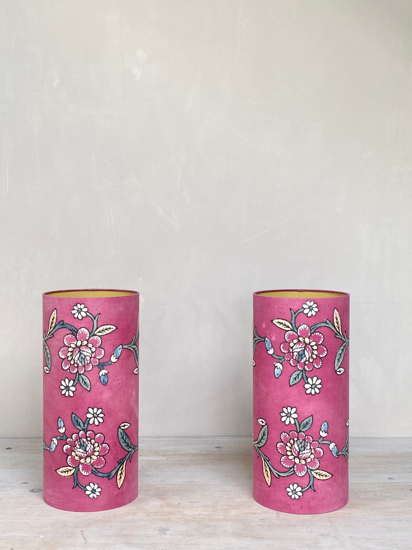 A pair of antique fabric cylinder lampshades