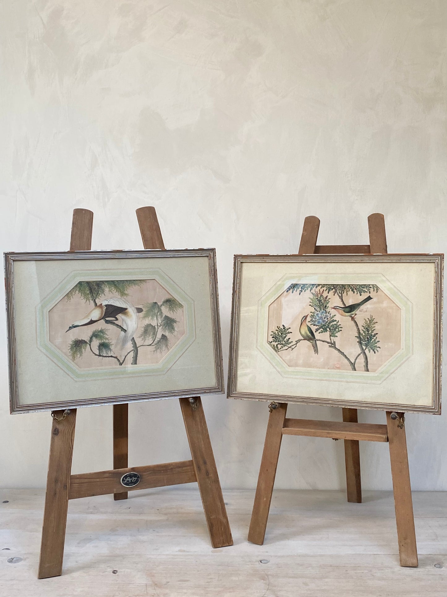 A pair of lovely Chinese silk hand painted water colours of birds in their original frames.